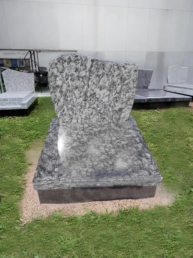 Tombe cinéraire compacte en granit moucheté gris et noir poli.